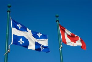 variations du français.drapeaux canadien et drapeau québecois.
